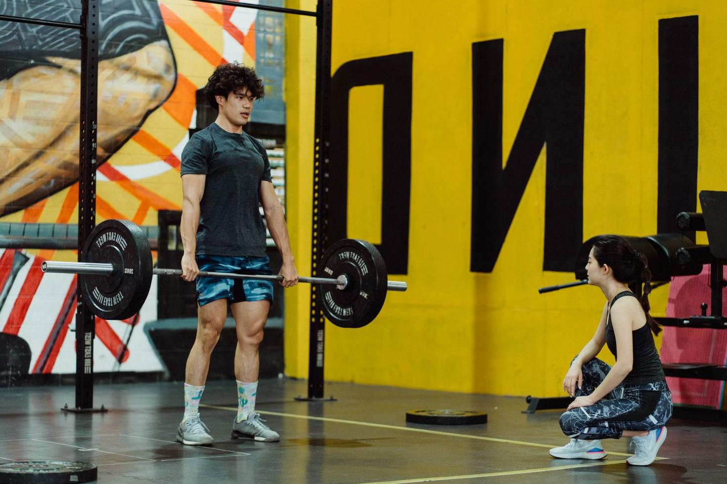 Coach guiding a member